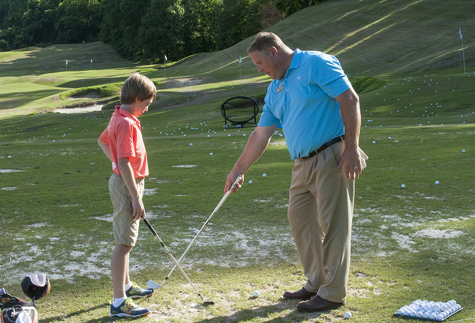 The Golf Club of South River Youth program with instruction from the clubs pros on the driving range in Edgewater, Maryland, June 15, 2018. (photo by Jim Preston)
These photos are for use by The Golf Club at South River.